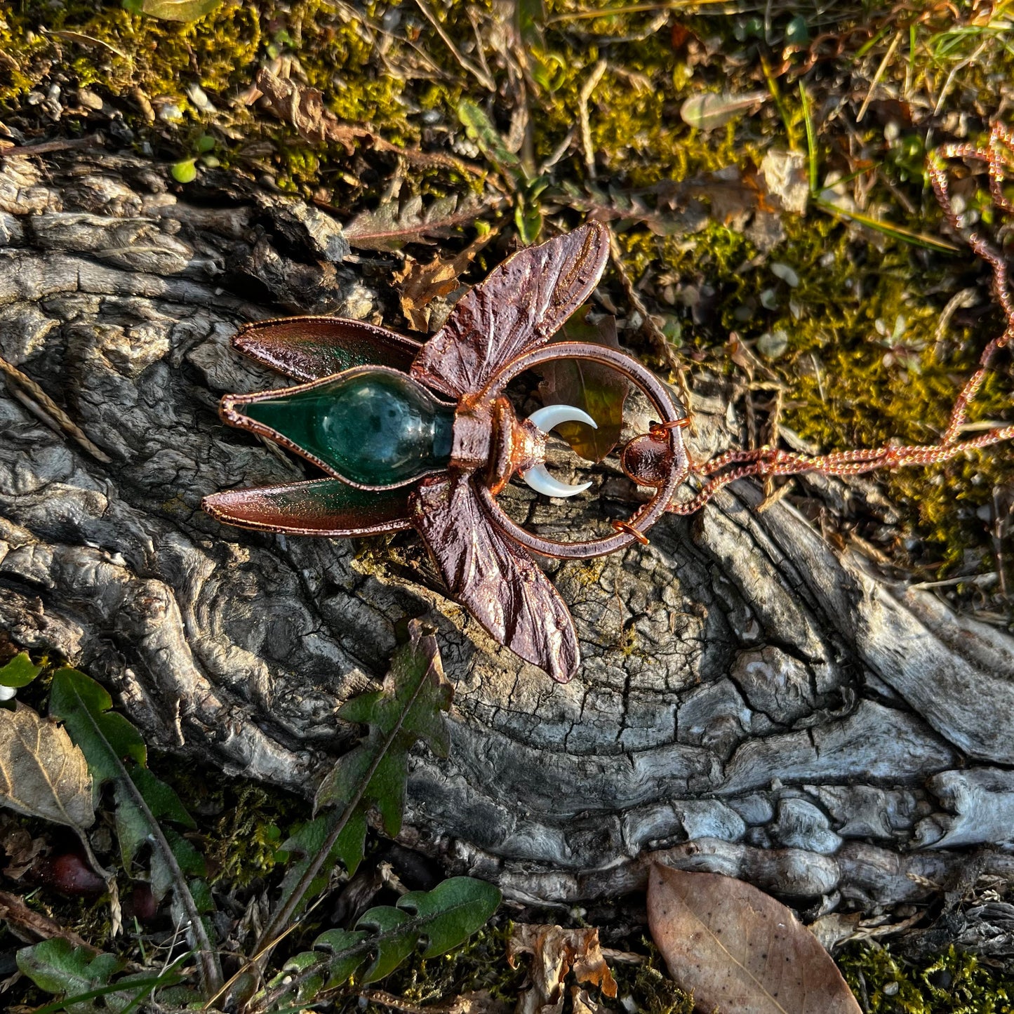 Chimera vial necklace with glittery green water, Copper eformed real beetle wings and elytras with two green onix and a seashell