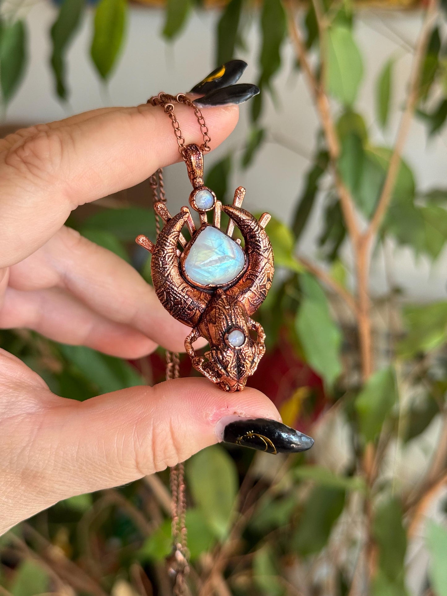 Copper eformed carved resin cat skull with Necronomicon symbols and rainbow moonstones on a satellite chain, witchy necklace