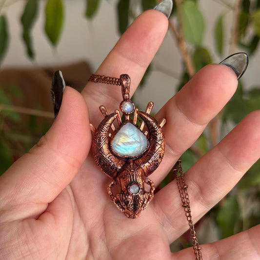 Copper eformed carved resin cat skull with Necronomicon symbols and rainbow moonstones on a satellite chain, witchy necklace