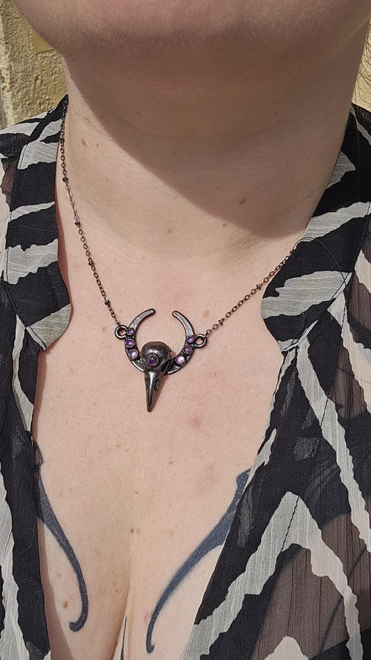 Goth Copper eformed 3d printed raven skull gunblack finish with amethysts on a moon frame, resin vegan skull on a short chain