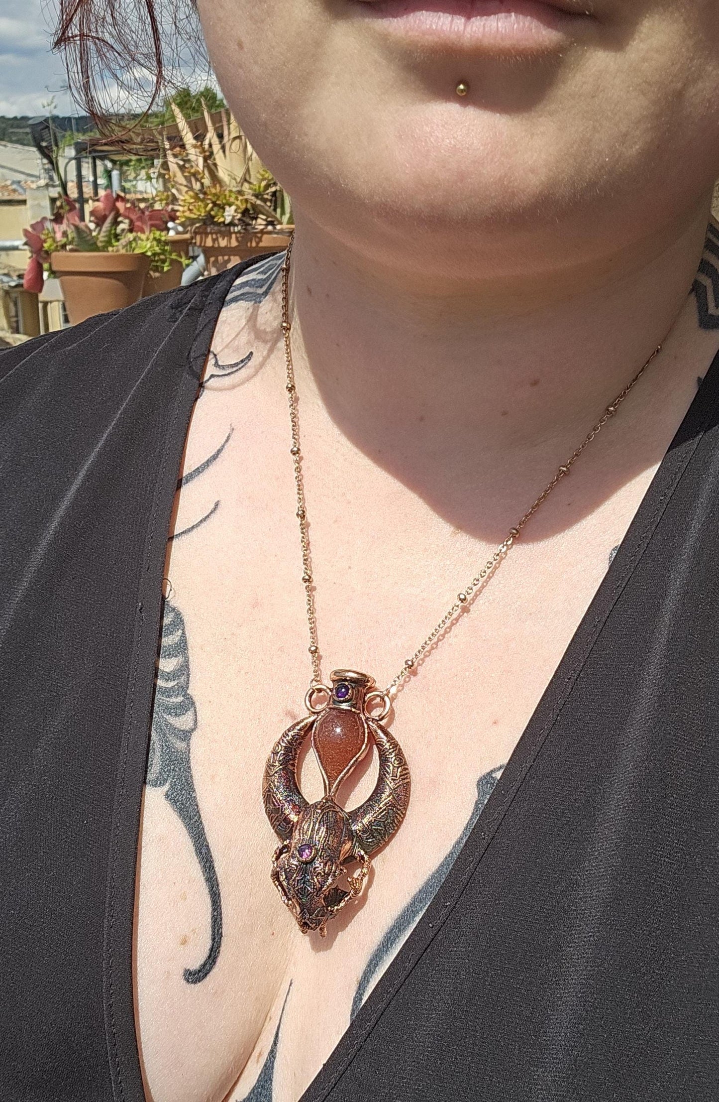 Copper eformed carved resin cat skull with Necronomicon symbols, a magic vial and amethysts on a satellite chain, witchy necklace