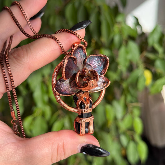Carved obsidian with a real orchid eformed in copper ,  naughty fairy,  delicate necklace on medium chain