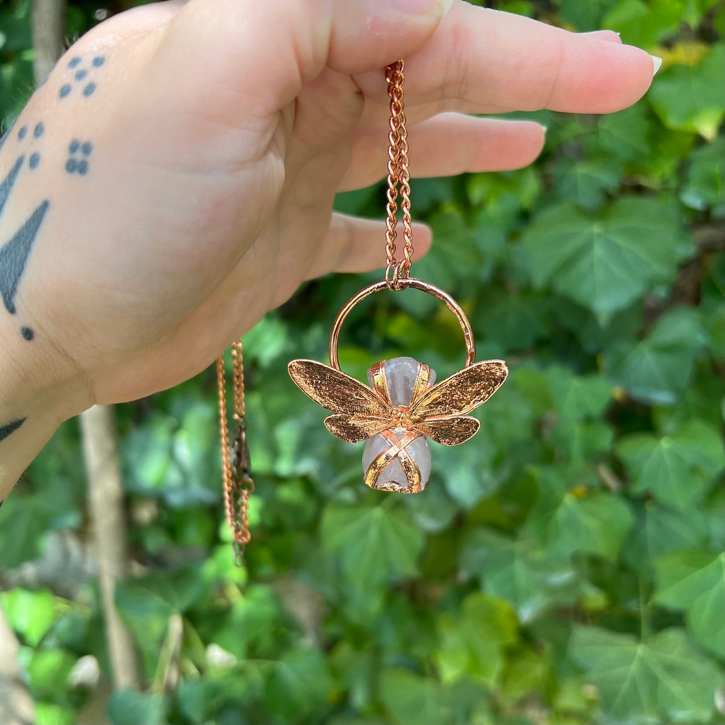 Carved quartz with cicada eformed wings, naughty fairy,  delicate necklace on a shiny medium chain