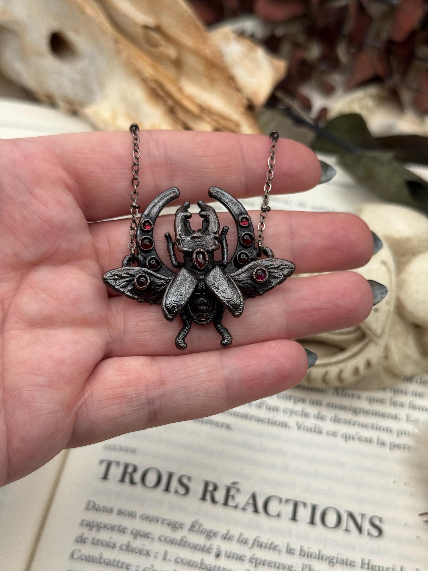 Small stag beetle with garnest on a moon frame, copper eformed necklace, unique piece Egyptian inspired with a dark finish