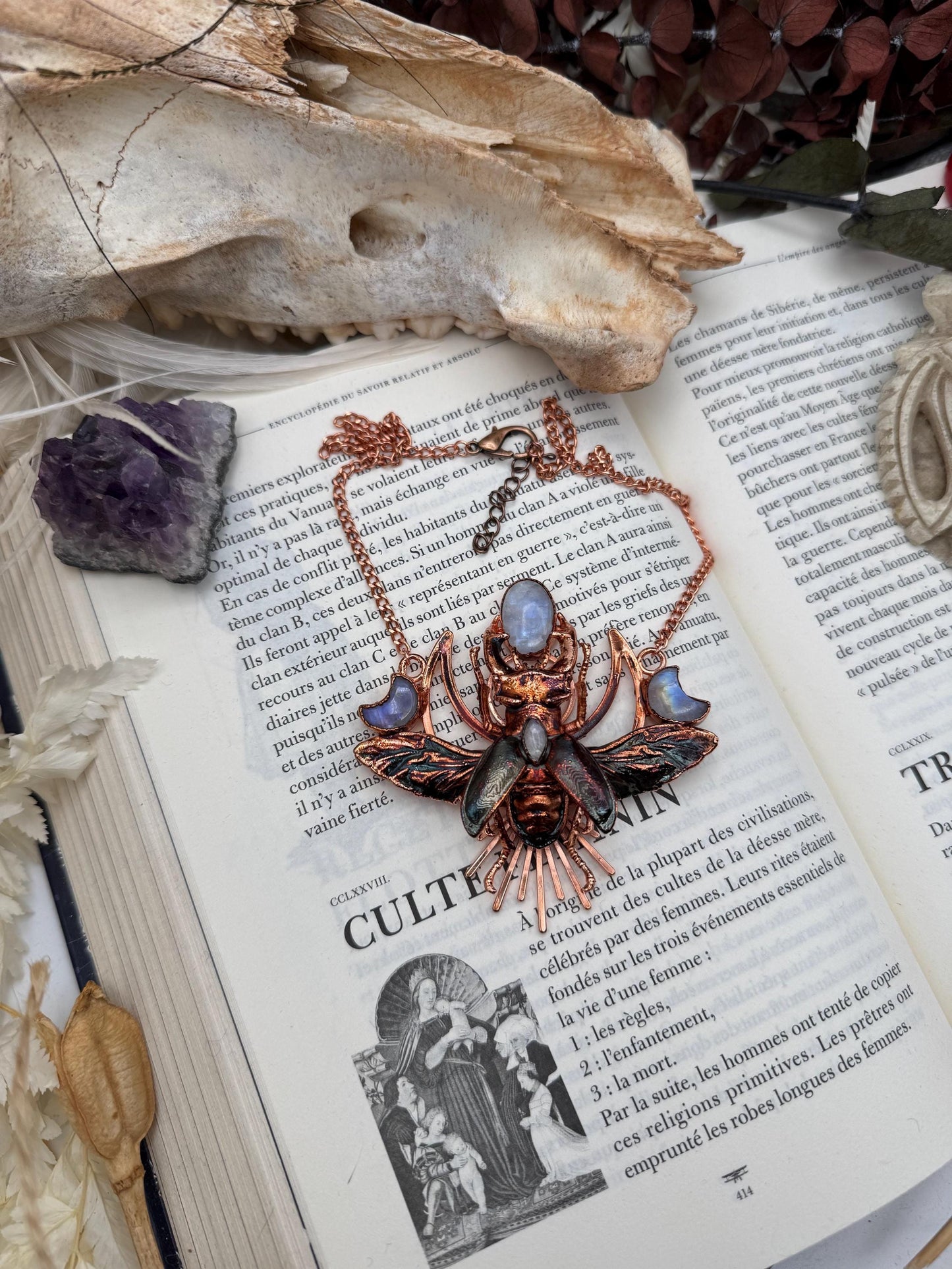 Eformed resin stag beetle with gorgeous rainbow moonstones