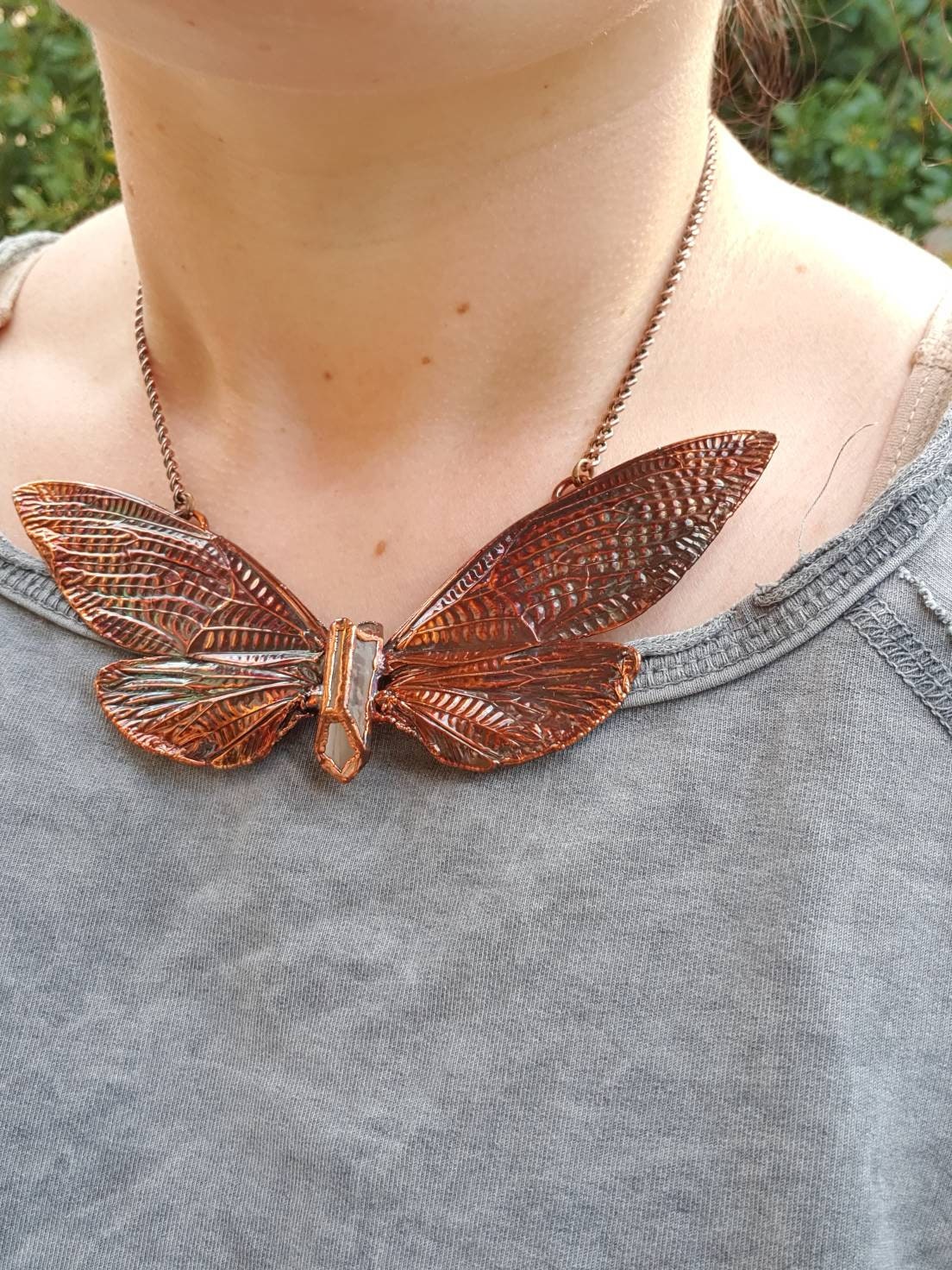 Real huge tropical cicada eformed with copper necklace on a caged quartz, torque oversize necklace