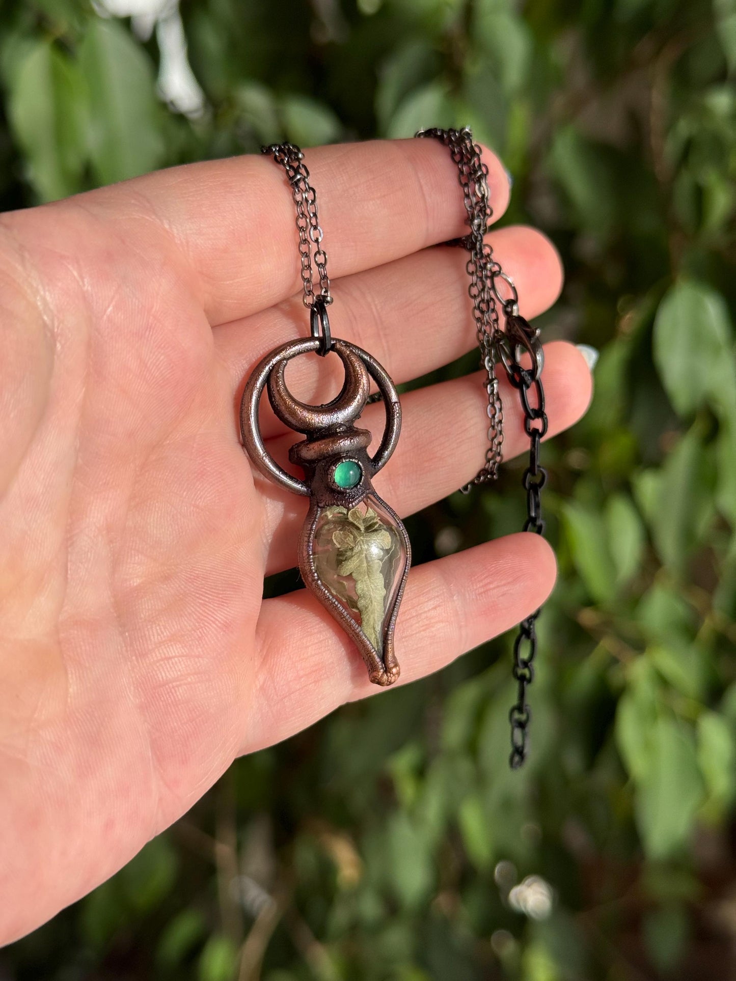Simple vial filled with fern, Copper eformed necklace with dark finish adorned with a tiny green onix