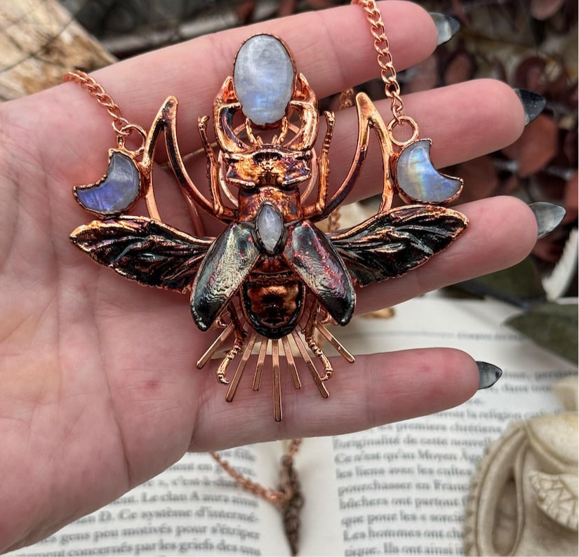 Eformed resin stag beetle with gorgeous rainbow moonstones