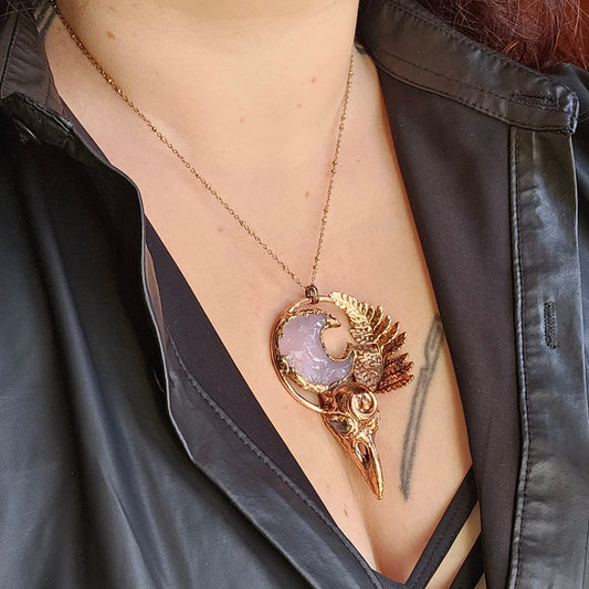Copper eformed resin raven skull with real fern and a pink quartz moon, with opalites in the eyes, light warm patina, witchy necklace