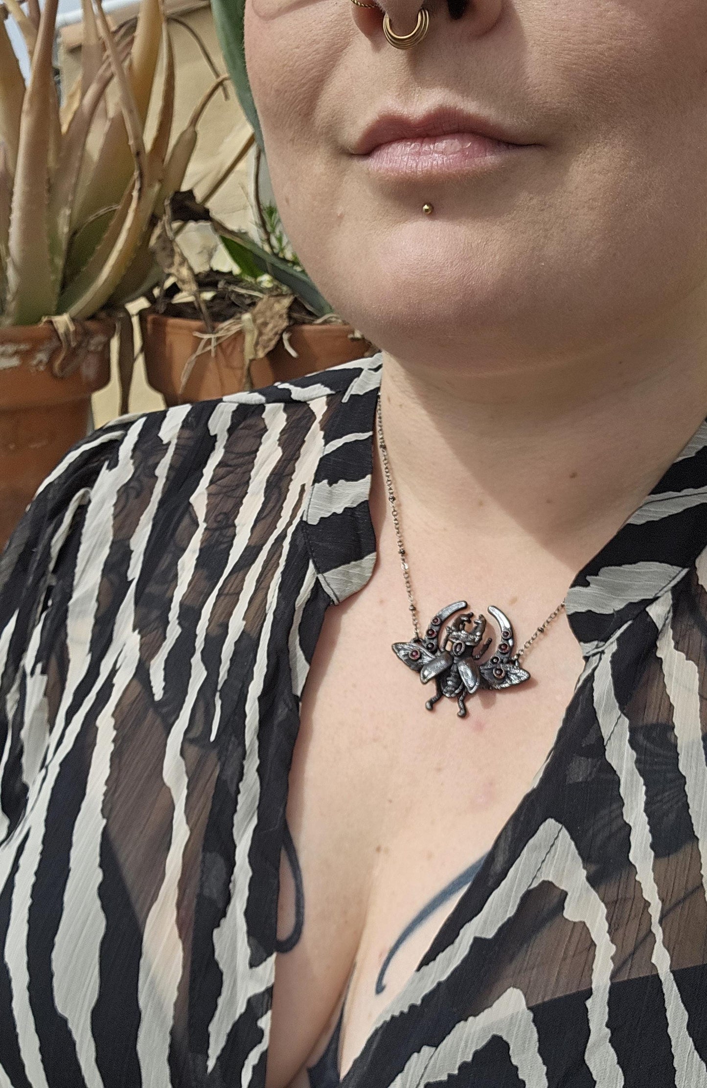 Small stag beetle with garnest on a moon frame, copper eformed necklace, unique piece Egyptian inspired with a dark finish