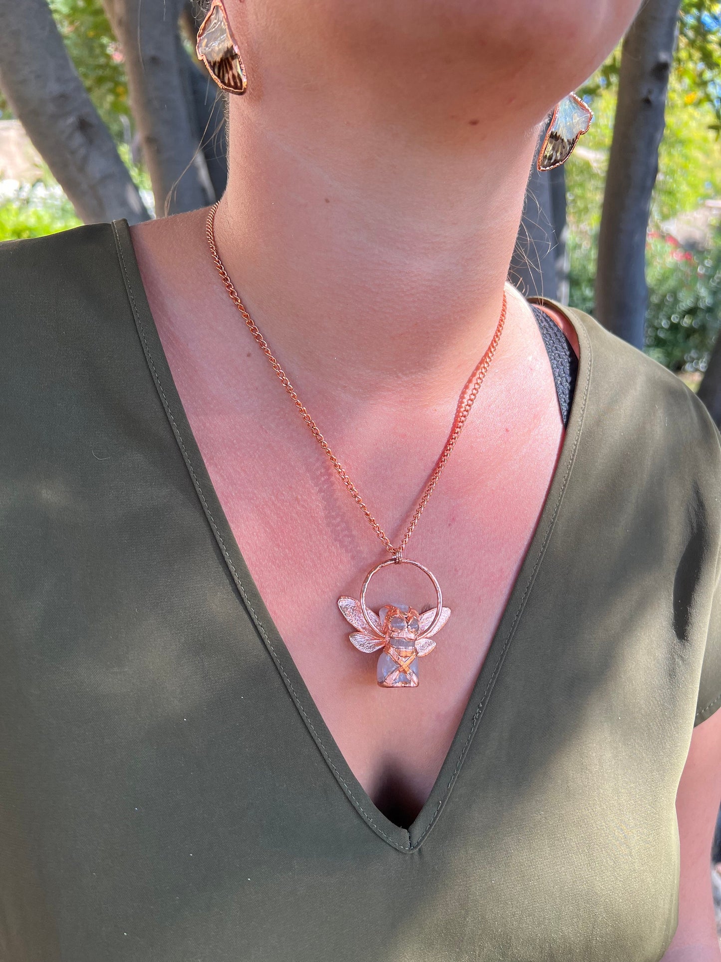 Carved quartz with cicada eformed wings, naughty fairy,  delicate necklace on a shiny medium chain