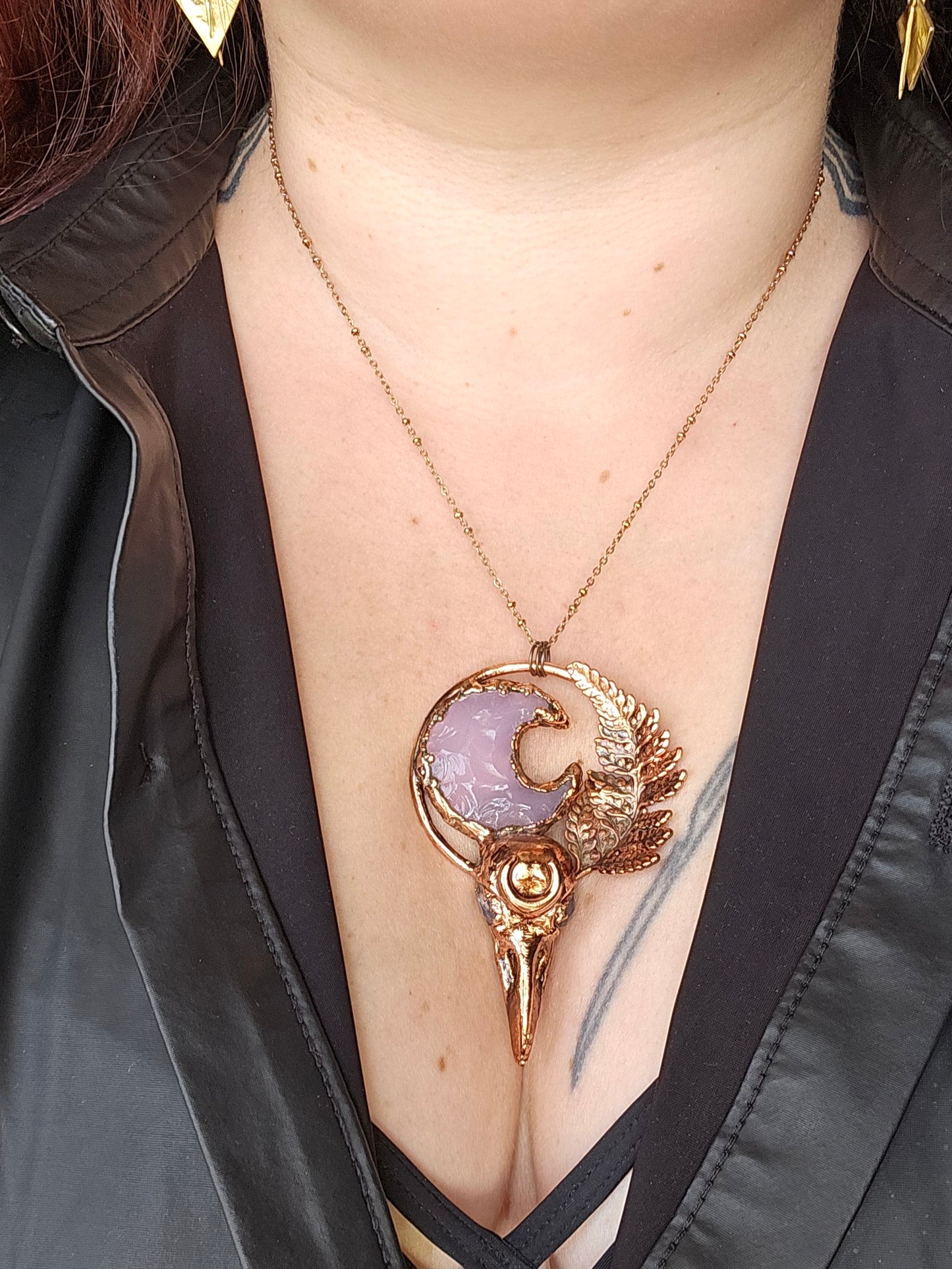 Copper eformed resin raven skull with real fern and a pink quartz moon, with opalites in the eyes, light warm patina, witchy necklace