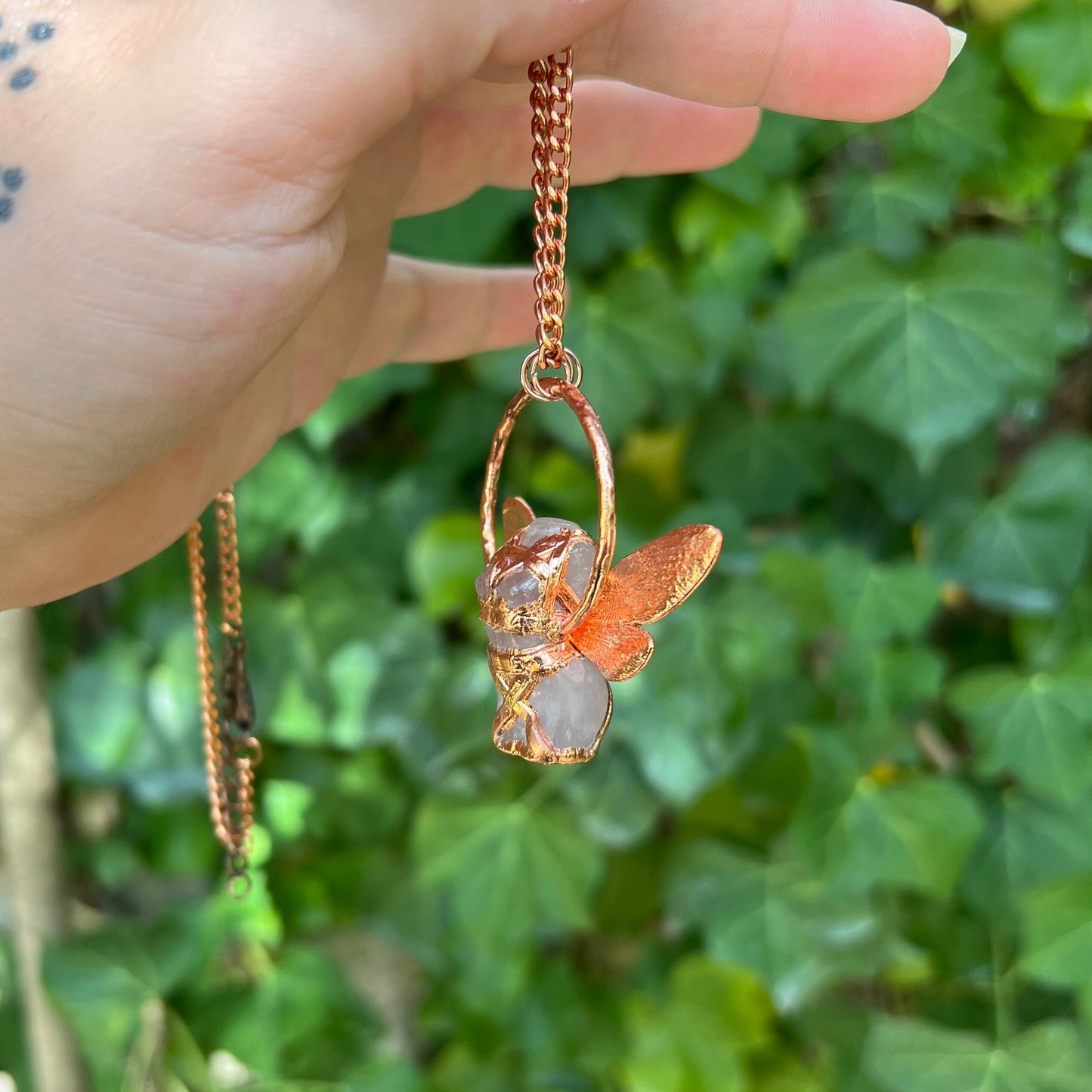 Carved quartz with cicada eformed wings, naughty fairy,  delicate necklace on a shiny medium chain