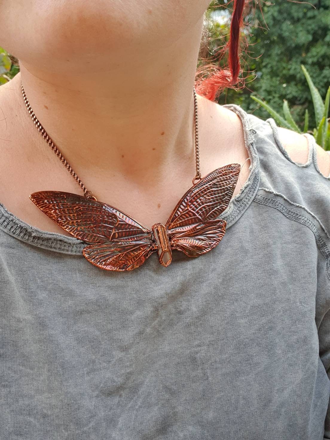 Real huge tropical cicada eformed with copper necklace on a caged quartz, torque oversize necklace