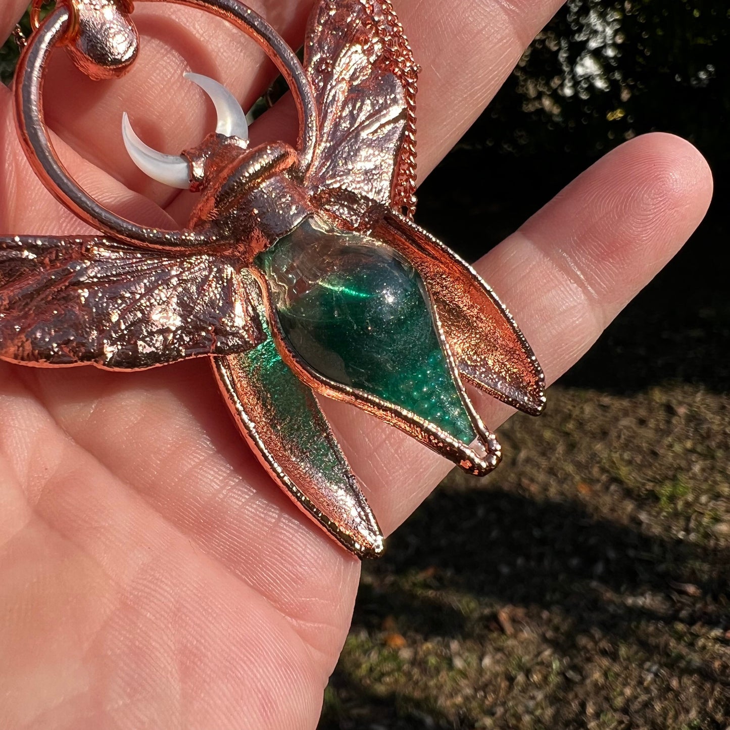 Chimera vial necklace with glittery green water, Copper eformed real beetle wings and elytras with two green onix and a seashell