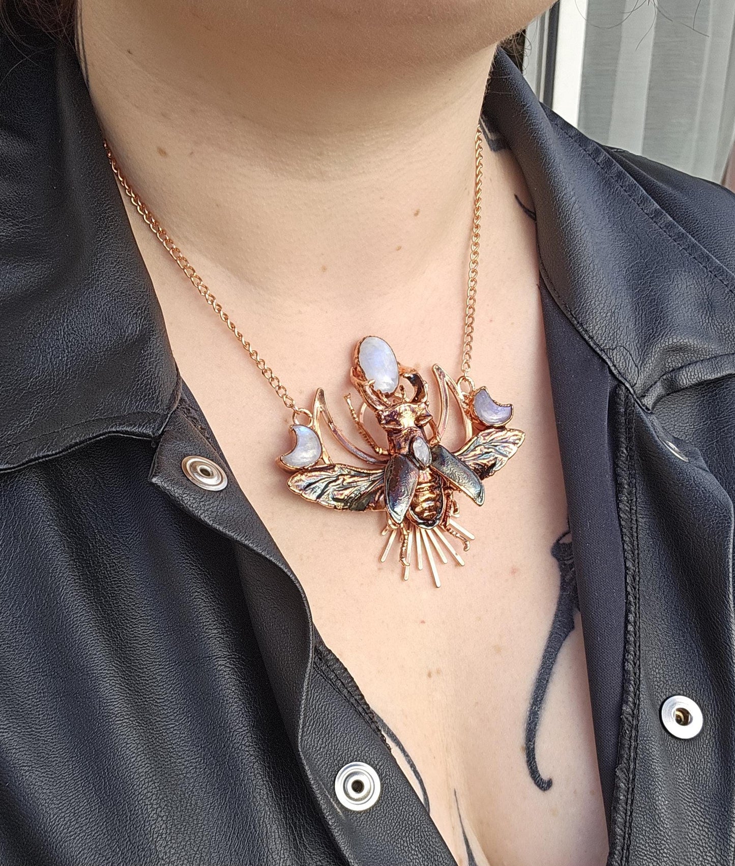 Eformed resin stag beetle with gorgeous rainbow moonstones