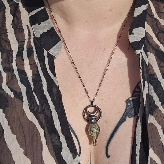 Simple vial filled with fern, Copper eformed necklace with dark finish adorned with a tiny green onix