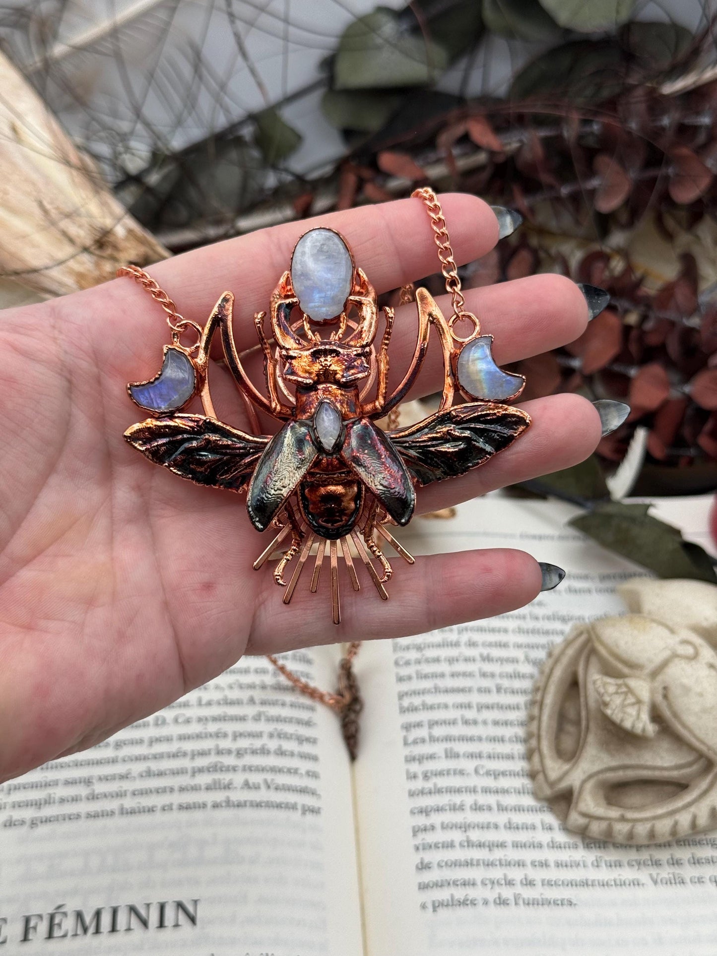 Eformed resin stag beetle with gorgeous rainbow moonstones