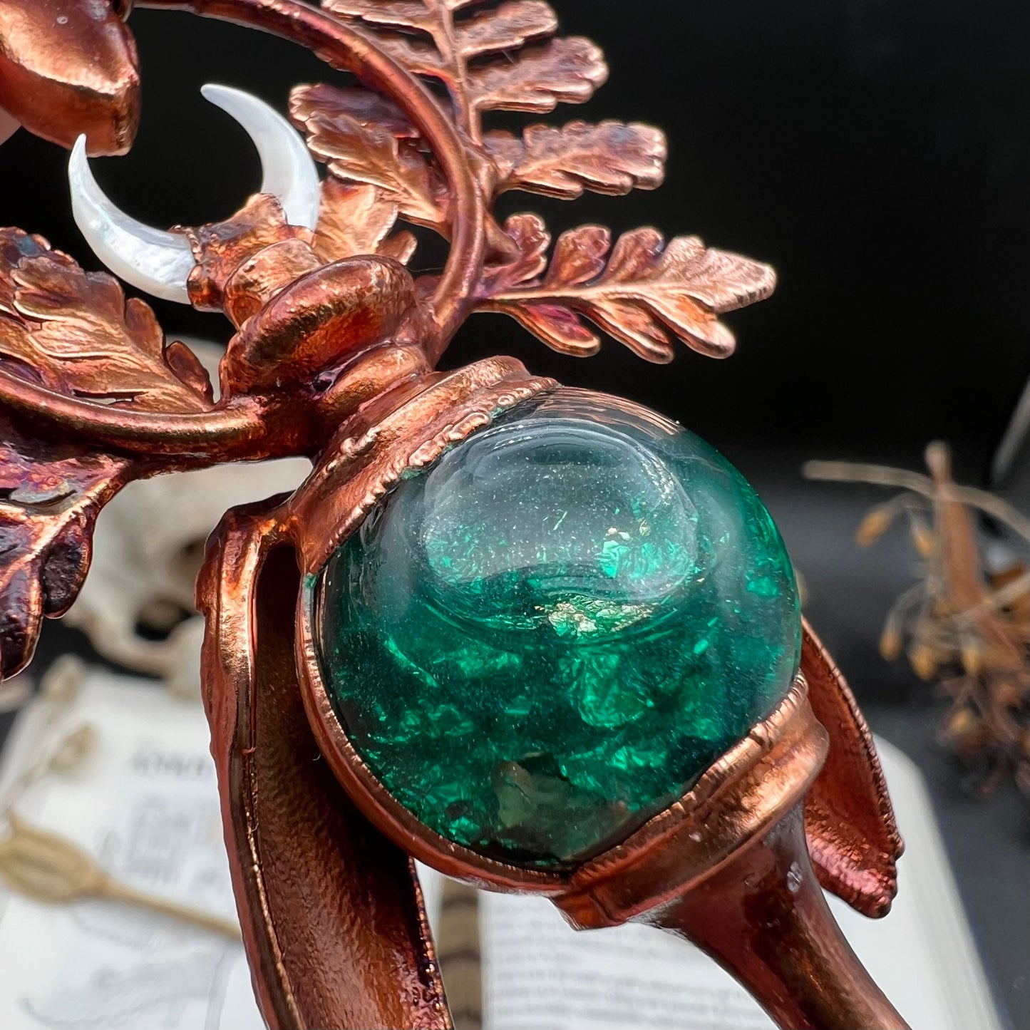 Chimera vial necklace with glittery green water, Copper eformed real beetle elytras with ferns wings, a rainbow moonstone and a white moon
