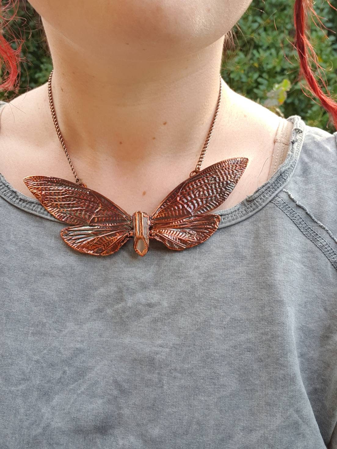 Real huge tropical cicada eformed with copper necklace on a caged quartz, torque oversize necklace