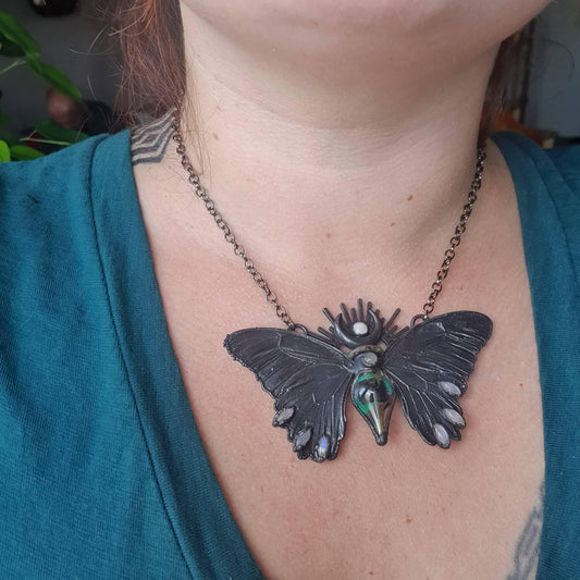 Fairy vial with a peacock feather in it, real eformed butterfly wings and cute moonstones, gunblack patinated short necklace
