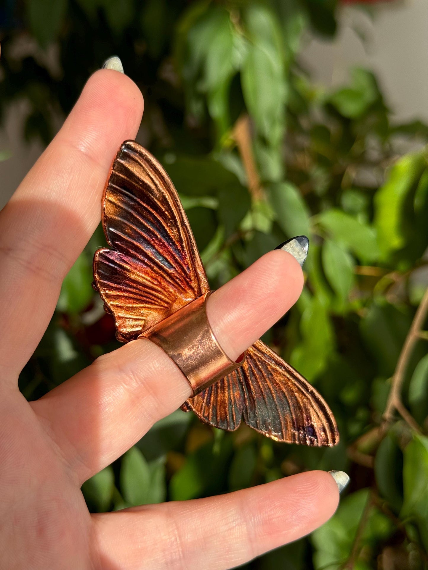 Butterfly ring with a quartz point and moonstones size 5.25 US/uk K, copper eformed with colorful patina