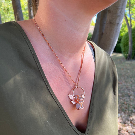 Carved quartz with cicada eformed wings, naughty fairy,  delicate necklace on a shiny medium chain