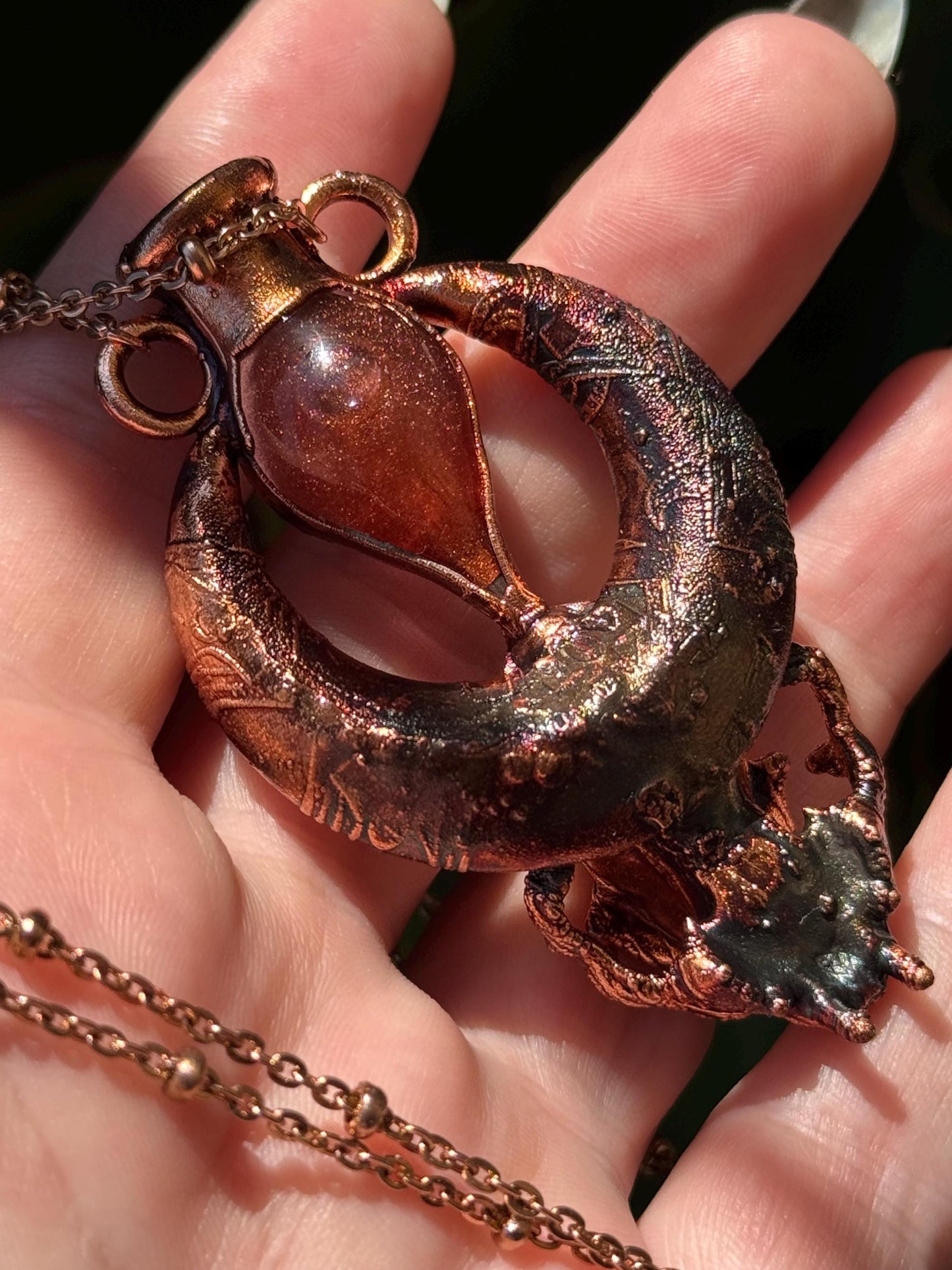 Copper eformed carved resin cat skull with Necronomicon symbols, a magic vial and amethysts on a satellite chain, witchy necklace