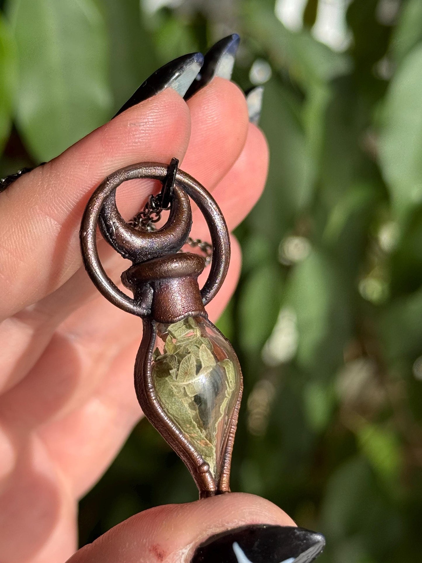 Simple vial filled with fern, Copper eformed necklace with dark finish adorned with a tiny green onix