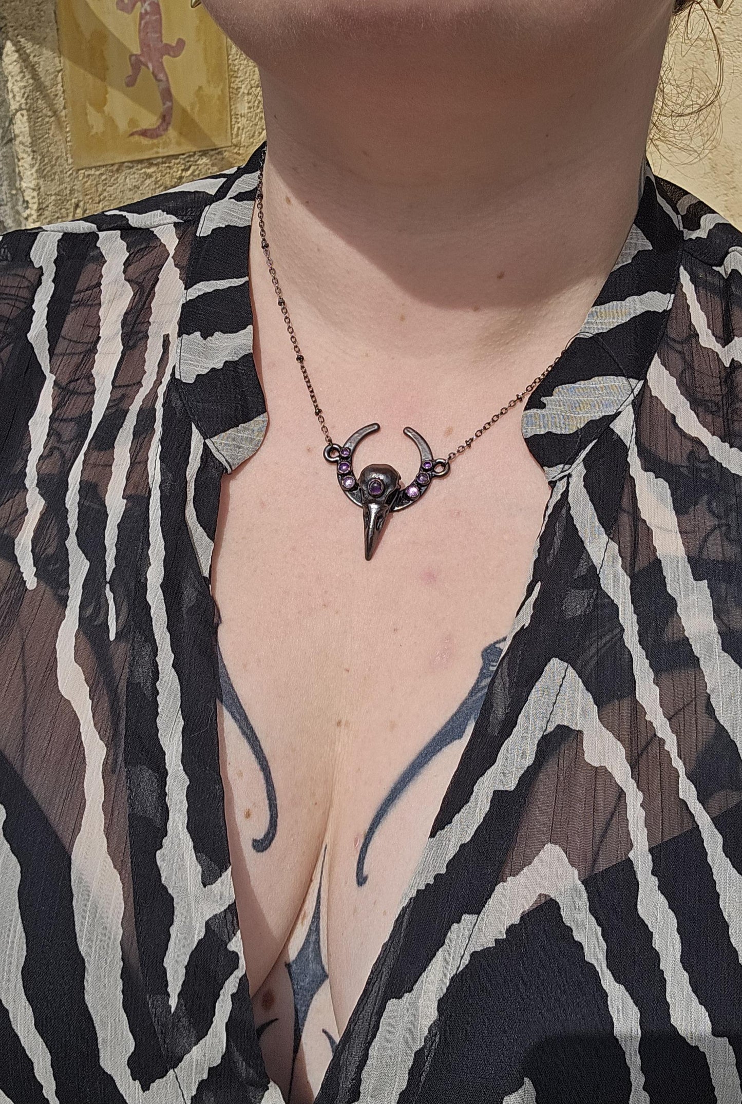Goth Copper eformed 3d printed raven skull gunblack finish with amethysts on a moon frame, resin vegan skull on a short chain