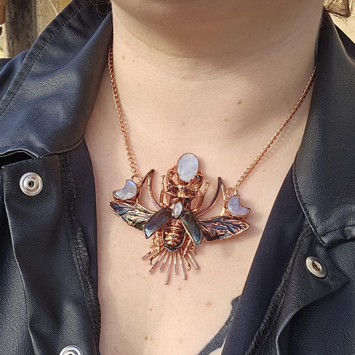 Eformed resin stag beetle with gorgeous rainbow moonstones
