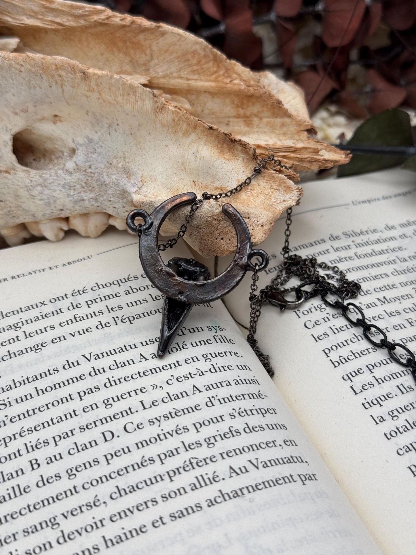 Goth Copper eformed 3d printed raven skull gunblack finish with amethysts on a moon frame, resin vegan skull on a short chain