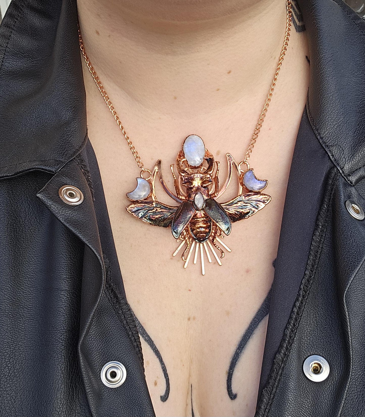 Eformed resin stag beetle with gorgeous rainbow moonstones