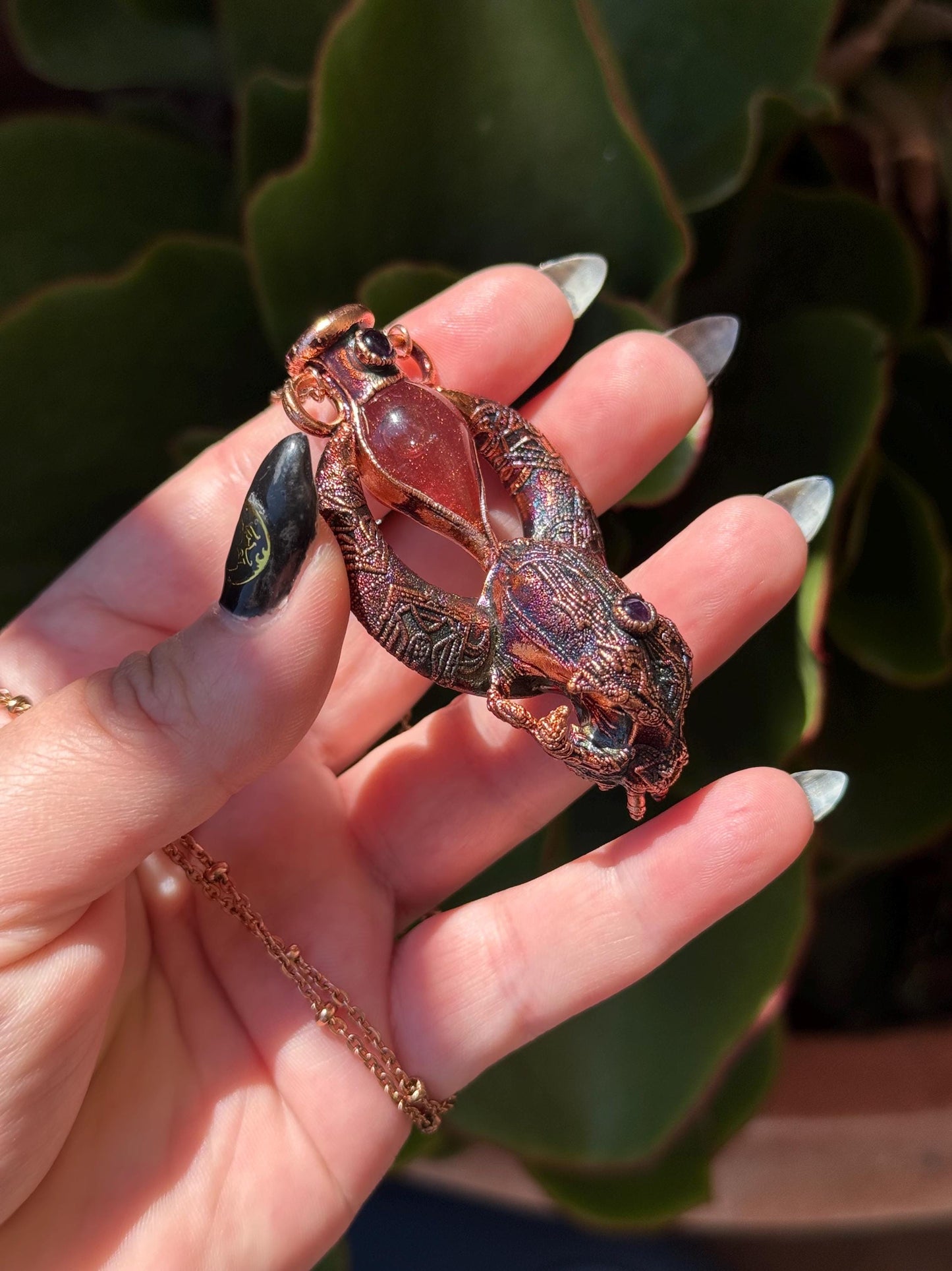 Copper eformed carved resin cat skull with Necronomicon symbols, a magic vial and amethysts on a satellite chain, witchy necklace