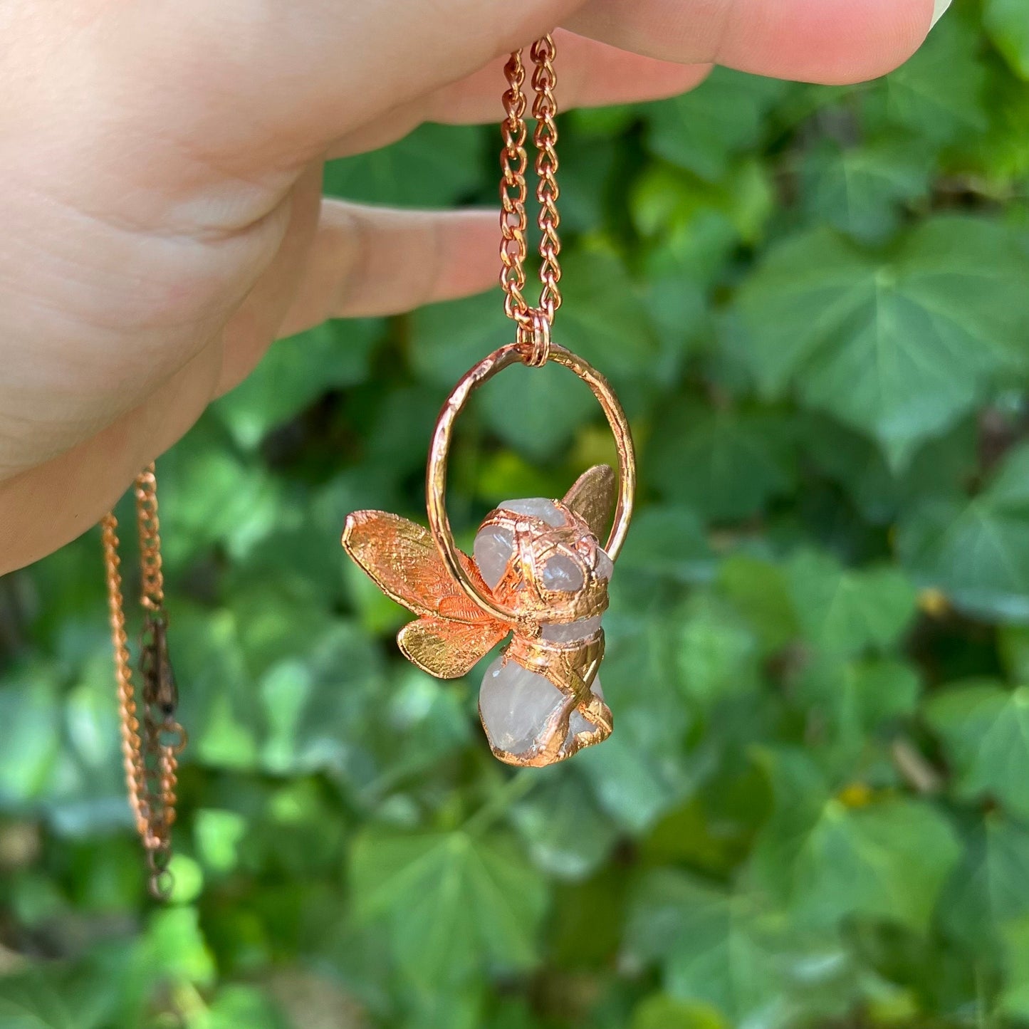 Carved quartz with cicada eformed wings, naughty fairy,  delicate necklace on a shiny medium chain