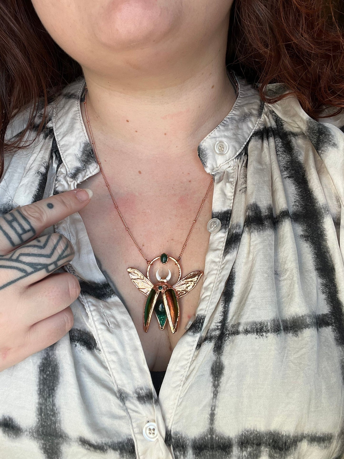 Chimera vial necklace with glittery green water, Copper eformed real beetle wings and elytras with two green onix and a seashell