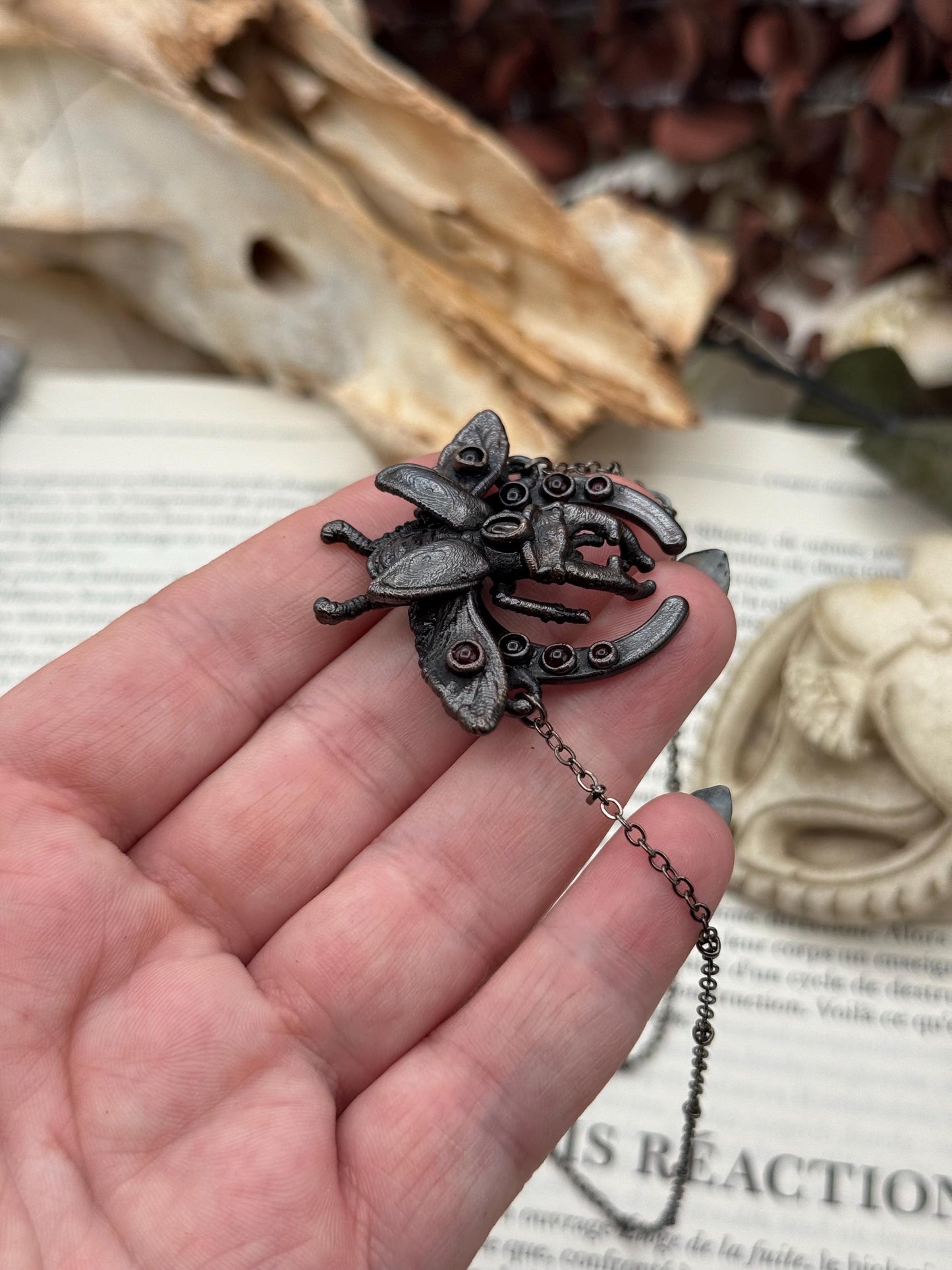 Small stag beetle with garnest on a moon frame, copper eformed necklace, unique piece Egyptian inspired with a dark finish