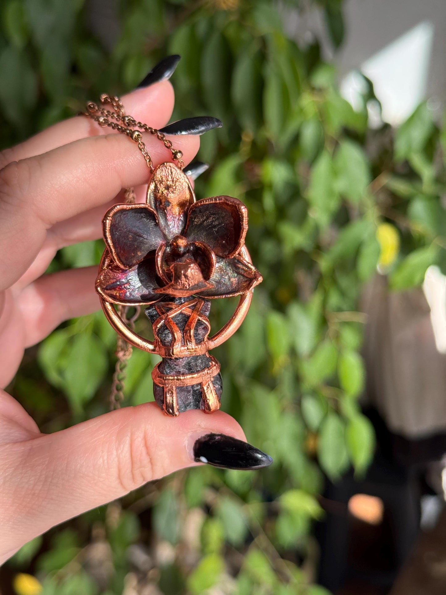 Carved garnet with a real orchid eformed in copper ,  naughty fairy,  delicate necklace on medium chain